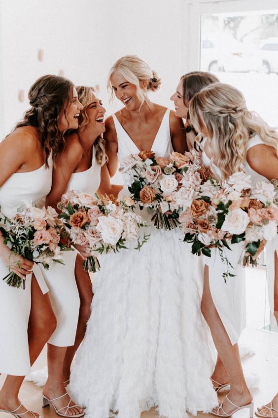 white bridesmaid dresses and white bridal gown for april wedding color schemes for 2023 white blush and orange